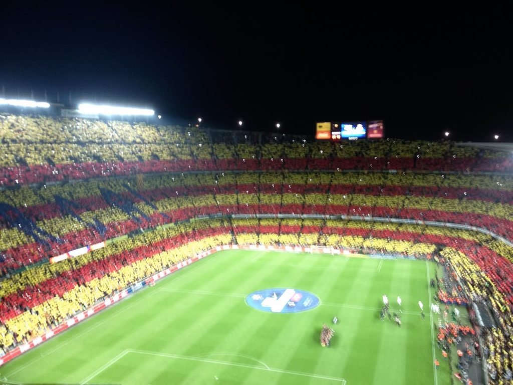 The Camp Nou crowd forming a giant red and yellow Catalan flag during El Clásico.